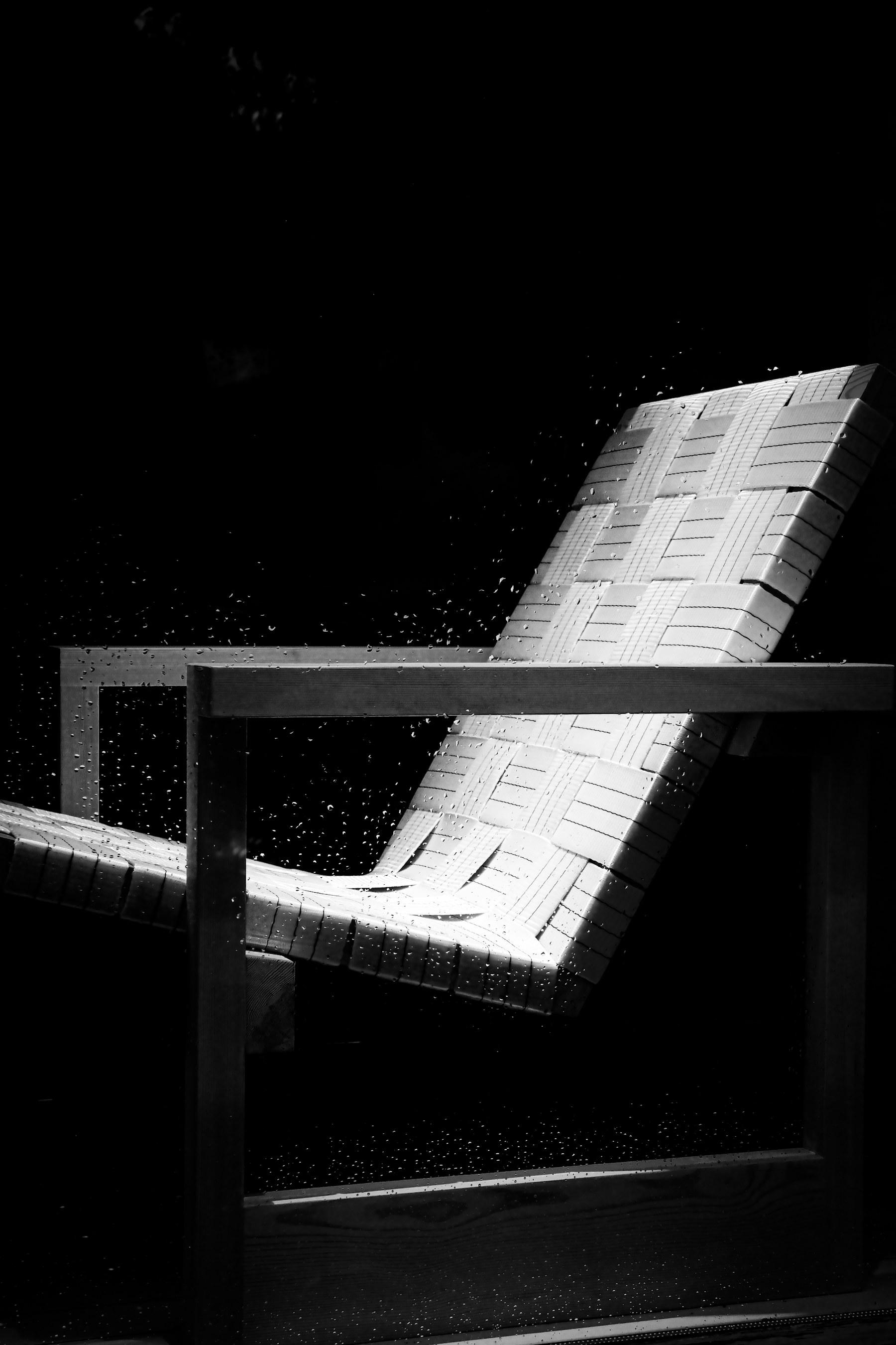 Sculptural lounge chair sourced by the Ultio desk